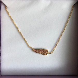 New in box! Melinda Maria pink rhinestone and gold feather necklace.